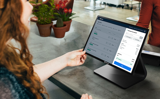 A budtender using Dutchie POS