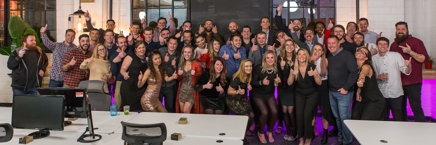A cannabis industry team celebrating together