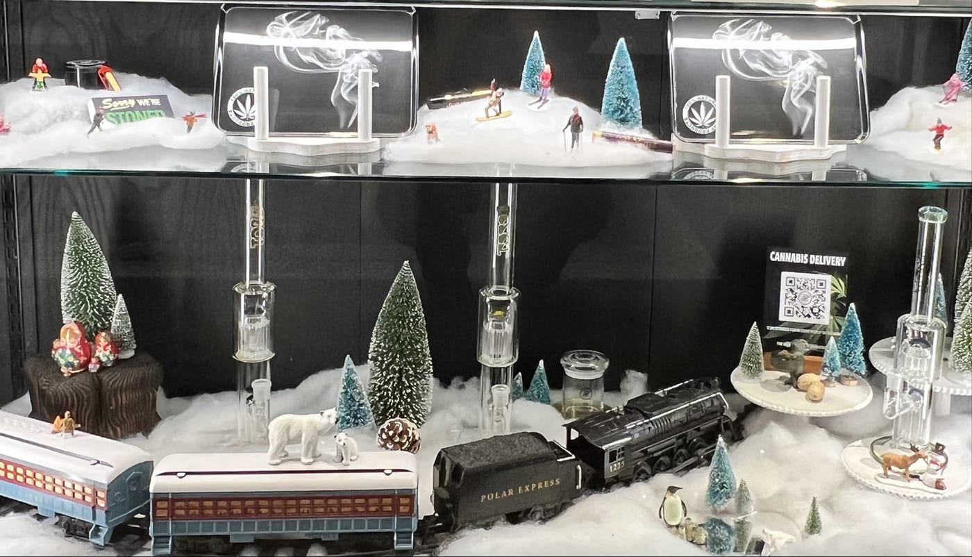 A winter-themed product display case at The Highly Connected